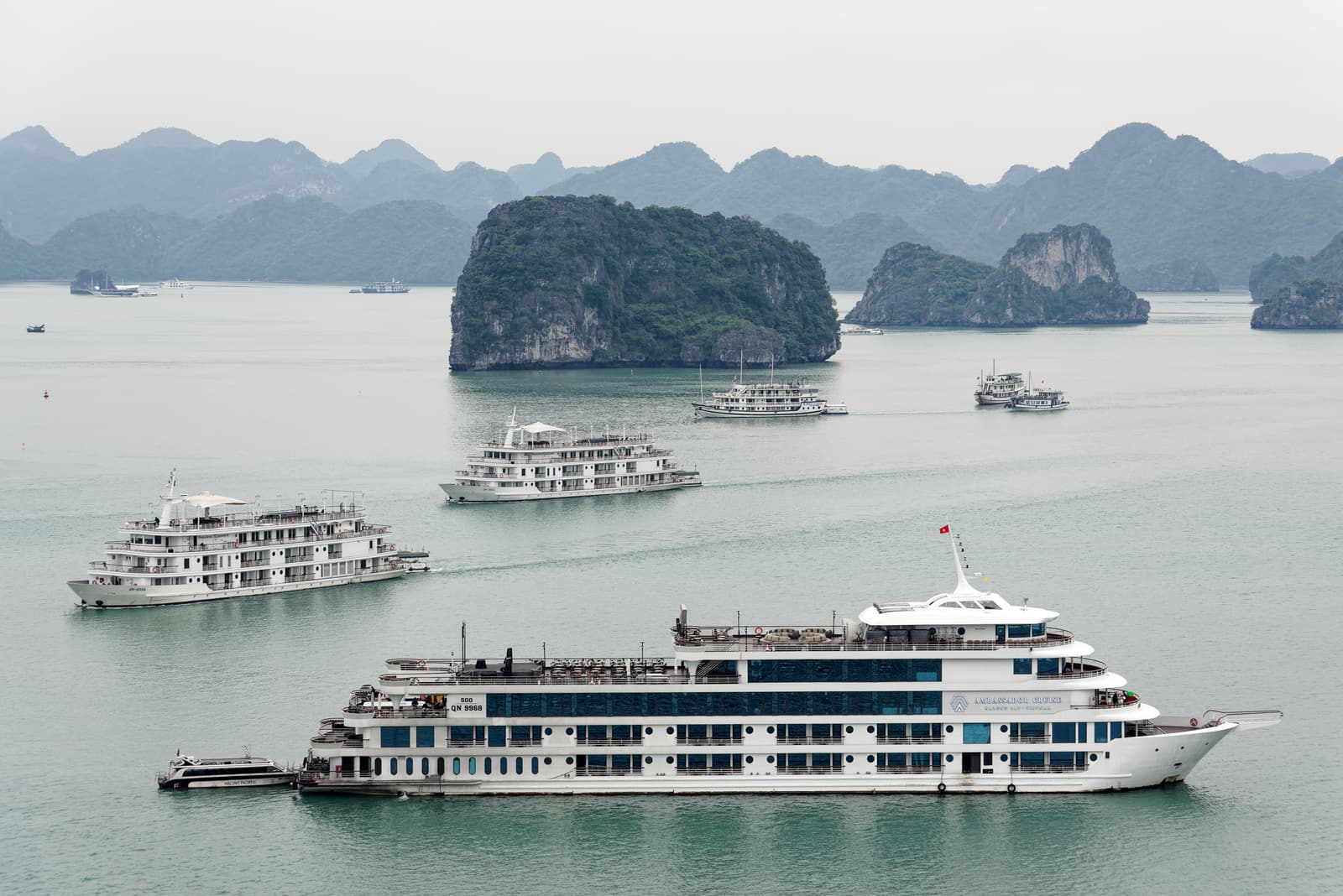 Limestone islands rising from the water of Ha Long Bay