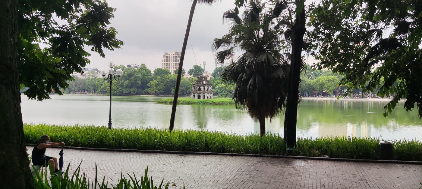 Hoan Kiem Lake and the Turtle Tower seen from the shore